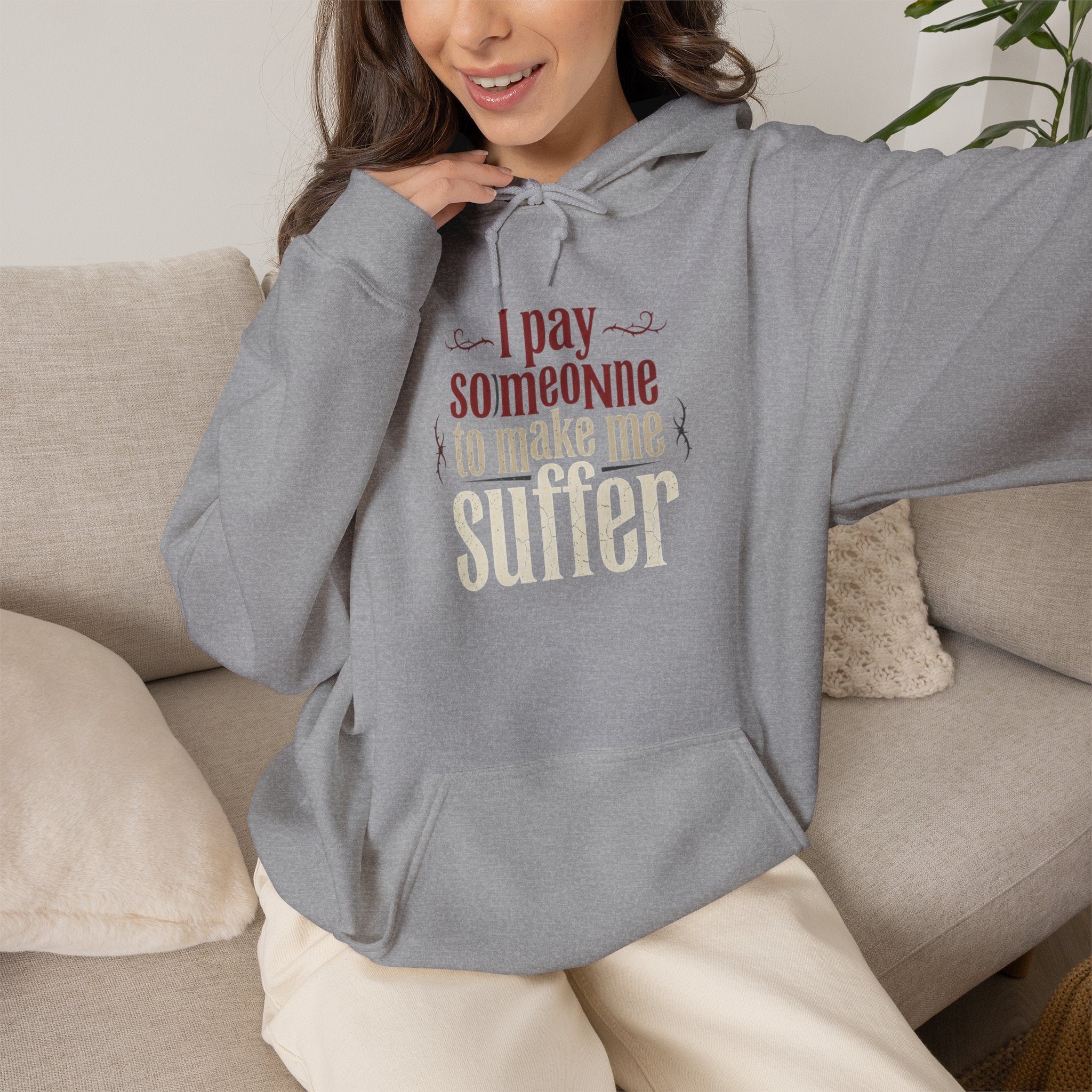 I Pay Someone To Make Me Suffer Unisex Heavy Blend™ Hooded Sweatshirt